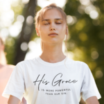 His Grace Is More Powerful Than Our Sin Christian White Tee